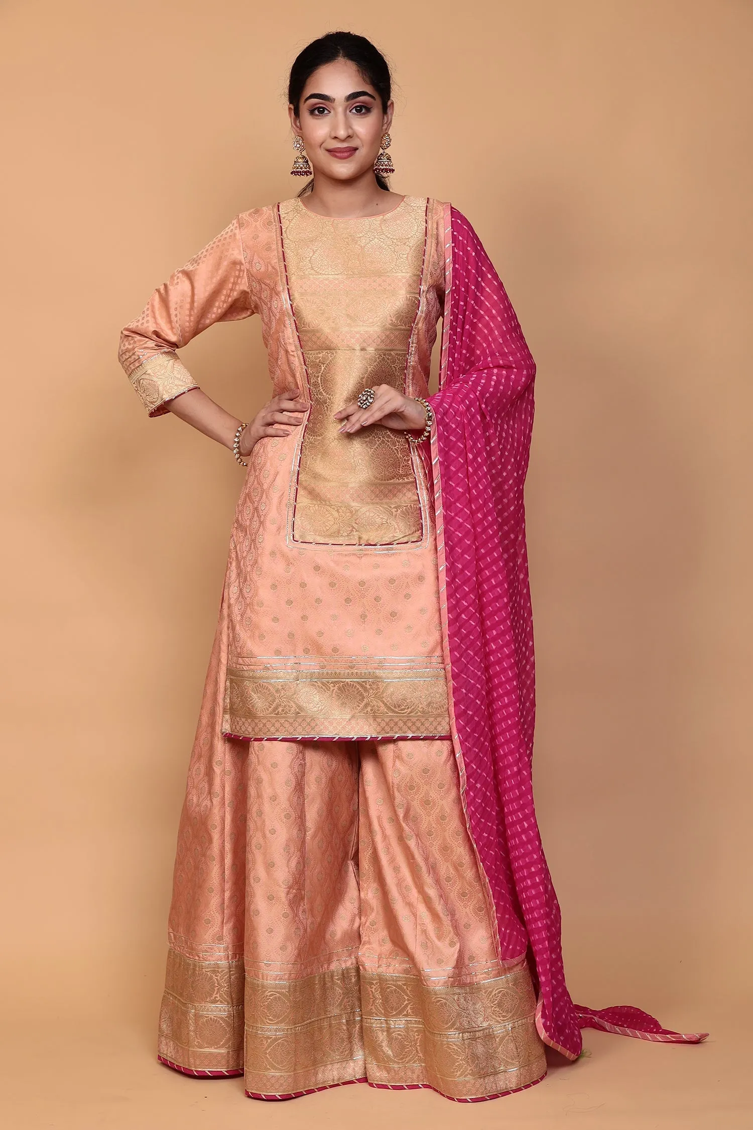 Banarasi Silk Suit with Gota work.