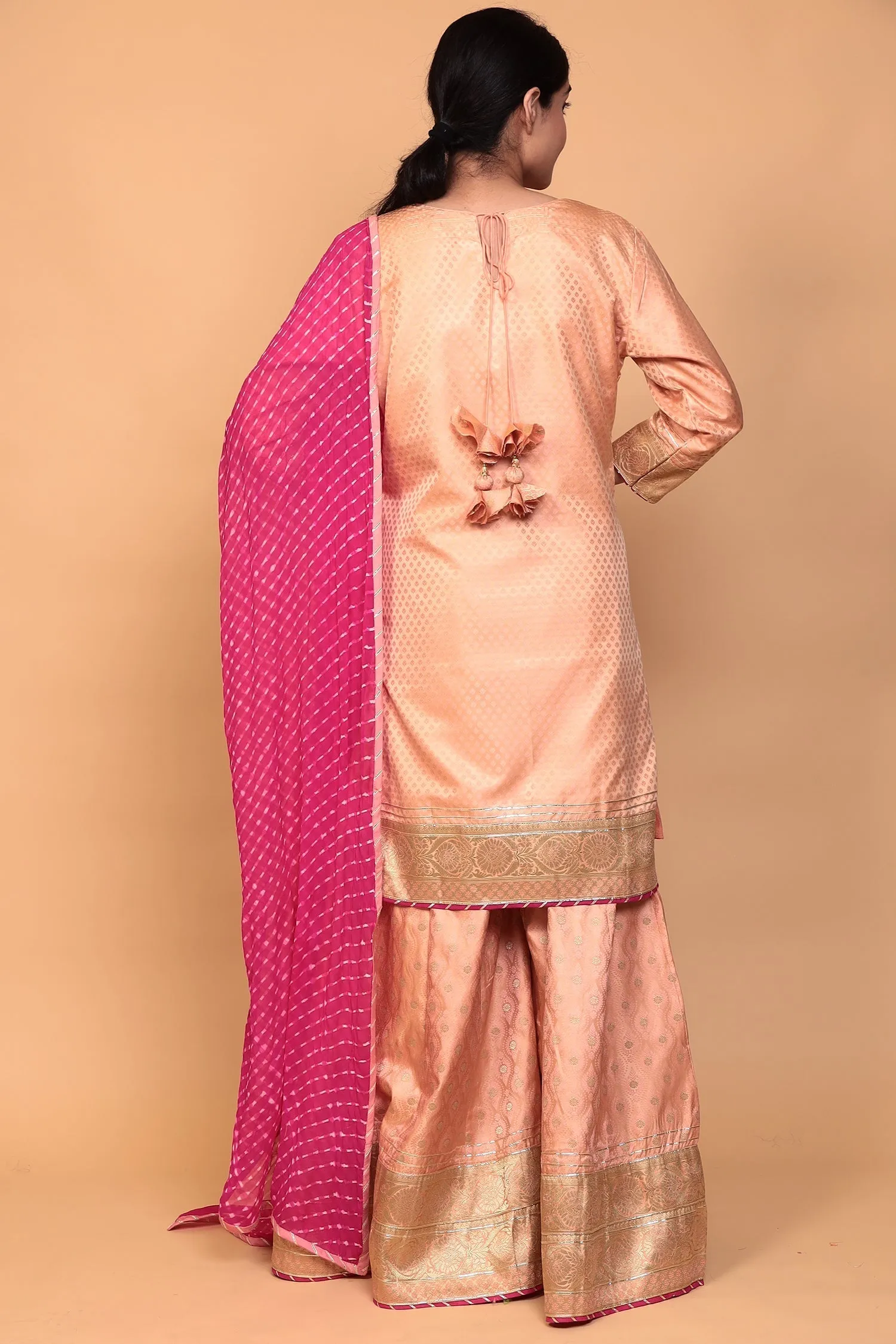 Banarasi Silk Suit with Gota work.